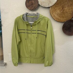 Reebok women's lightweight hooded windbreaker jacket in a‎ lime green Large